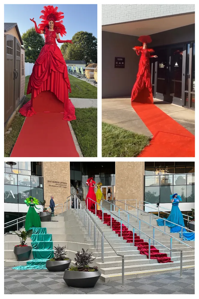 Living red carpet performers welcoming guests at an entrance