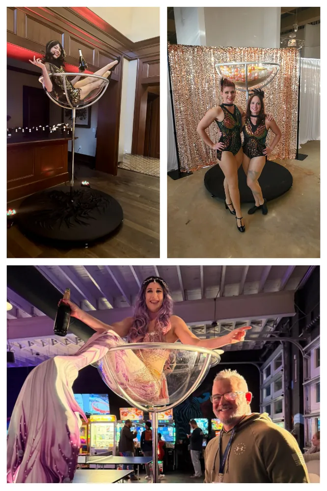 Martini glass performer posing in a giant cocktail glass